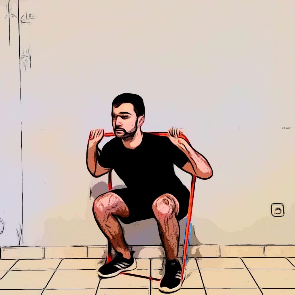 squat avec élastique : votre exercices avec élastique pour renforcer les jambes, et plus spécifiquement les quadriceps